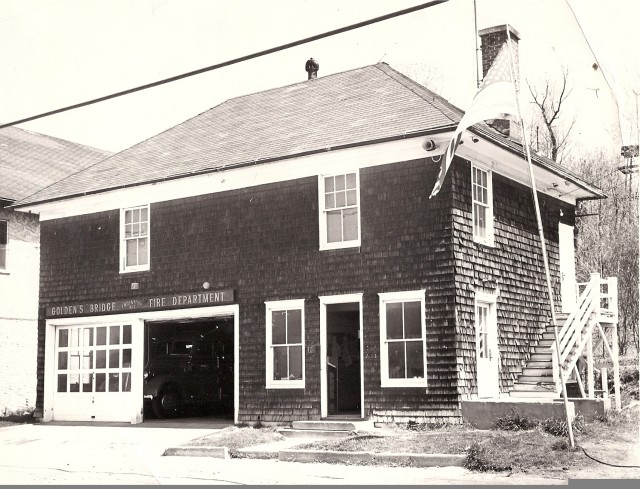 The old Golden's Bridge fire house was constructed in 1911 by volunteers. It housed two fire engines, 139 & 138. The fire house was demolished in 1966 due to the construction of I-684. The sign above the bay doors is hung in our fire house meeting room wall